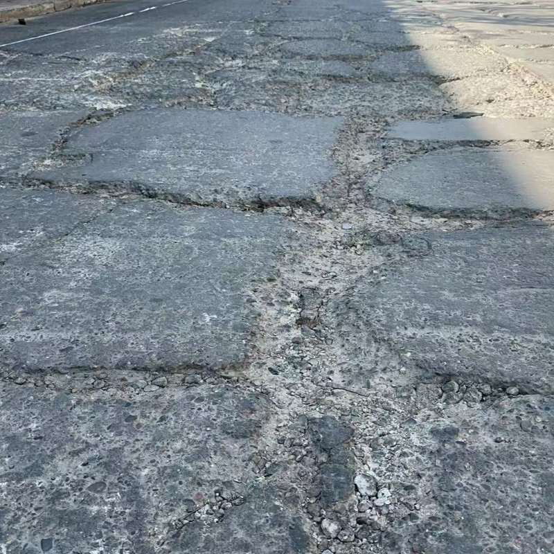 大石桥路面起砂露石子修补料